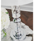 Close-up of Big Glam Crystal Bead Table Lamp With Clear Glass Tubes And Shiny Chrome Finish on wooden table