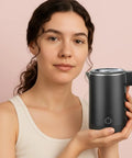 Woman holding 0.5L Portable Electric Kettle For Travel And Office Stainless Steel Mini Tea And Coffee Kettle Hot Water Boiler, black