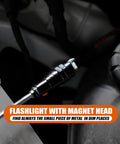 Telescoping Magnetic Pickup Tool Set With 1 Lb And 15 Lb Pick Up Sticks with magnetic flashlight in an engine bay
