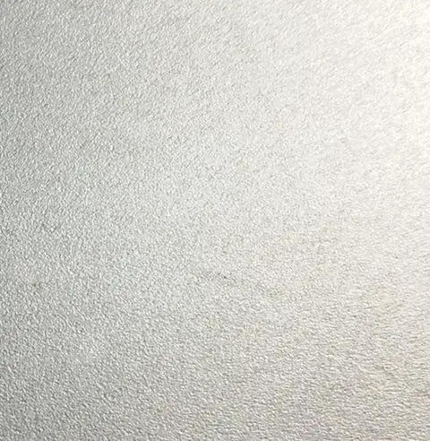 Close-up of polished stainless steel surface, reflecting light, used in Ninety Six Inch S Pvc Low Profile Drainage Kit.