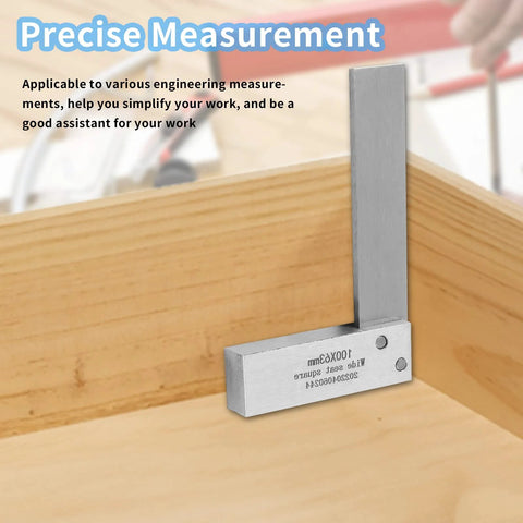 Steel machinist square, 4x2.5 in, L-shaped measuring tool mounted on a wooden edge to check 90-degree angle.