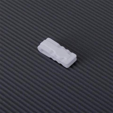 10 Pack Vacuum Bag Clips With Sliding Grip For Tight Seals, white plastic clip on dark textured background