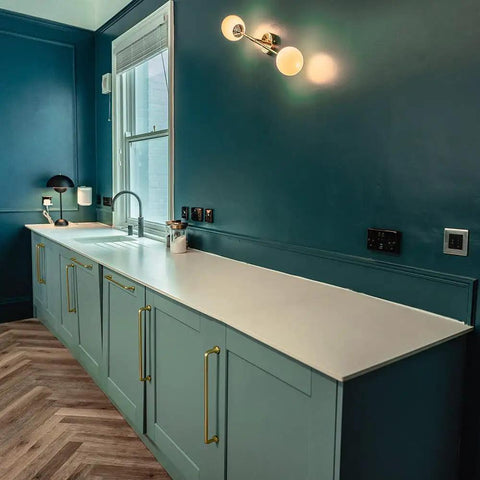 Modern kitchen with cabinets featuring Six Pack Modern Cabinet Pulls In Light Brushed Brass Center To Center Seven And Nine Sixteenths Inches.