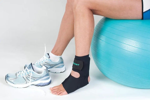 Person wearing Airheel Ankle Support With Stabilizers For Fast Swelling Relief And Better Circulation, Pulsating Aircell Therapy.