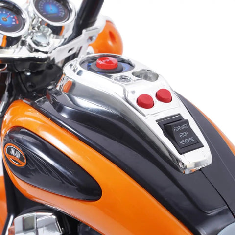 6V Battery Powered Electric Chopper Style Motorcycle Ride On Trike Toy For Kids Ages 3 To 6 Orange With Realistic Design Easy Pedal Drive Safe Beginner Friendly Features, orange control panel close-up