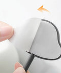 3 Pc Wall Mounted Hooks Set Grey Creative Home Storage Solution For Keys Towels And Sundries showing adhesive backing being peeled.