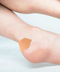 Self Adhesive Heel Protectors Soft Foam Cushion Pads For Shoes Wear Resistant Anti Blister Heel Grips on bare heel.
