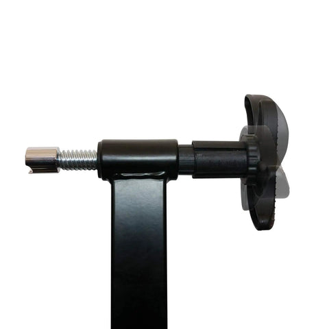Side view of the attachment mechanism of the Beefy Steel Bike Trainer Stand With Front Wheel Riser Block Quiet Magnetic Bicycle Trainer For Home Workouts Stable Floor Protection Realistic Road Feel Supports Up To 330 Lb.