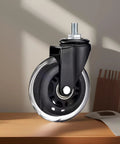 Set Of Five 3 Inch PU Caster Wheels With Locking Brakes For Heavy Duty Furniture And Work Carts shown in close-up on a table.