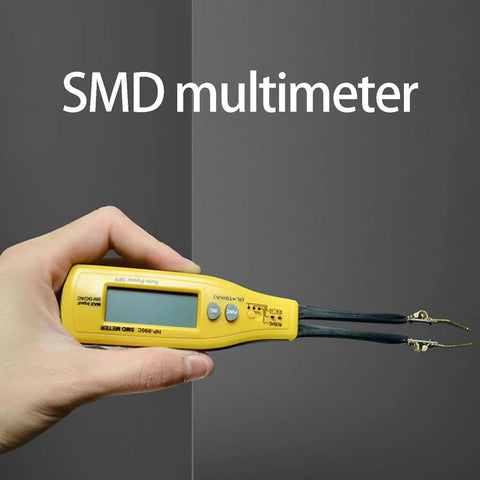 Digital Multimeter With LED Clip Probes For Non Solder Testing held in hand, showing yellow body and LED clip probes.
