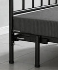 2 Pack Heavy Duty Adjustable Headboard Brackets For Metal Bed Frame With Universal Footboard Extension Kit Fits Queen King Twin showing installation on a black metal bed frame.