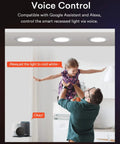 Alexa-controlled 4 Pack 6 Inch Ultra Thin Smart WiFi Recessed Canless Downlights, father lifting child, illustrating voice command use.