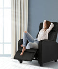 Woman relaxing in Massage Recliner Chair With Footrest In PU Leather Plush Padded Wide Seat Wingback Sofa For Living Room And Home Theater Comfy Cloud
