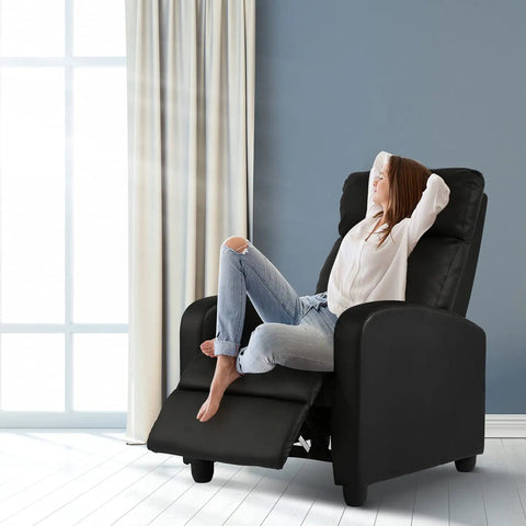 Woman relaxing in Massage Recliner Chair With Footrest In PU Leather Plush Padded Wide Seat Wingback Sofa For Living Room And Home Theater Comfy Cloud