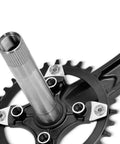 Close-up of Crank Arm Set 175mm 104 BCD With Bottom Bracket Kit And Chainring Bolts For MTB BMX And Road Bikes in aluminum.