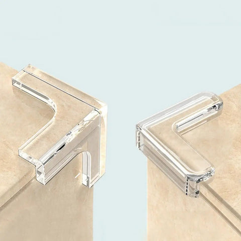 Close-up of two clear Triangular PVC Corner Protectors Set Of 10 With Corner Brace Design installed on wooden surfaces