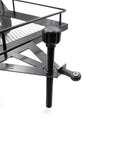 Close-up of Heavy Duty Metal RC Trailer With Dual Axles And Integrated Suspension articulating hitch detail.