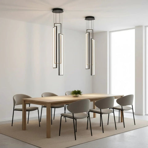 Sleek Modern LED Chandelier With Three Lights Black Kitchen Island Pendant For Living Room Dining Room Foyer Remote Dimmable High Ceiling Fixture 33 Inch Tall 6 Inch Wide above dining table in minimalistic dining room.