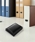 Black Bubble Mailers 13x18 Plus 4 Padded Envelopes With Self Seal Adhesive on office desk next to binders.