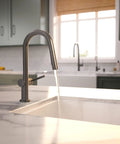 hansgrohe Talis N Pull Down Kitchen Faucet, Modern, Magnetic Hand Sprayer, 1-Handle, 1.75 GPM, Brushed Black Chrome, 72866341 with flowing water