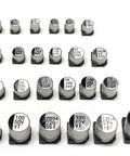 400 Piece SMD Aluminum Electrolytic Capacitor Kit With 24 Value Assortment From 1uF To 1000uF 50V Rating neatly arranged in rows