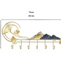 Modern Wall Mount Coat Rack Featuring Seven Heavy Duty Metal Hooks That Truly Knock Your Socks Off For Entryway Organization Hat Jacket Scarf Display Slick Home Upgrade in gold with decorative design.