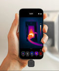 Person holding iPhone with Nano 200 Thermal Camera for iPhone And iOS With USB C Connector, displaying heat detection on screen.