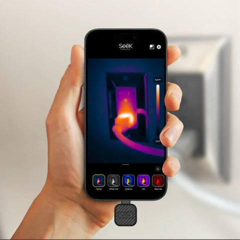 Person holding iPhone with Nano 200 Thermal Camera for iPhone And iOS With USB C Connector, displaying heat detection on screen.