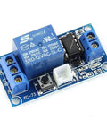Close-up of a Two Pack 12V Single Bistable Self-Locking Relay Module Push To Start And Stop With Low Level Trigger for DIY projects.