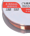Close-up of spool of 0.02mm copper wire for soldering, red and white label, durable and tensile text visible, top view.