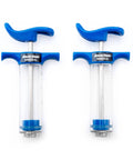 Dual syringes from BKM12 Hydraulic Brake Bleed Kit For Mineral Oil with blue handles shown isolated on white background.