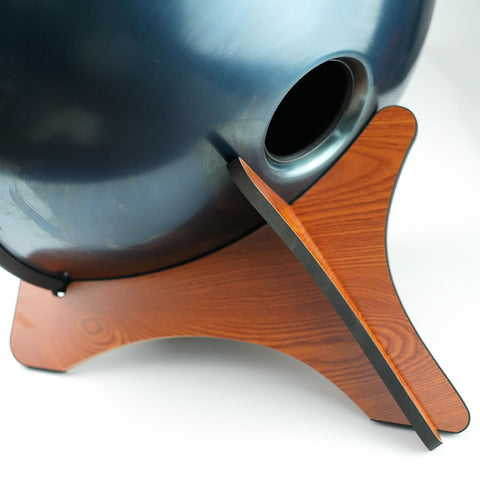 Built Like A Tank Wood Handpan Stand, Compact Display Rack For Steel Tongue Drums, showing support for a steel tongue drum.