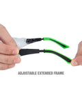 Hands adjusting flexible earpieces on Safety Glasses With Readers Plus 3.00 Magnification, UV Protection, ANSI Z87 High Impact Lenses.