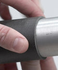 Ultra Slick Flexible Mass Loaded Vinyl Soundproofing Barrier Roll One Pound High Density Acoustic Insulation Sheet installed on aluminum pipe.