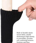 Close-up of black knitted furniture leg cover being placed on chair leg, featuring 32 Piece Knitted Chair Leg Protectors Set Non Slip Wear Resistant Noise Reducing Furniture Feet Covers Fits Most Legs From 2.3 To 6.6 Inches Black Style 2