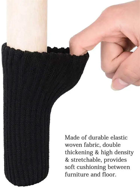Close-up of black knitted furniture leg cover being placed on chair leg, featuring 32 Piece Knitted Chair Leg Protectors Set Non Slip Wear Resistant Noise Reducing Furniture Feet Covers Fits Most Legs From 2.3 To 6.6 Inches Black Style 2
