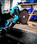 User operating a Heavy Duty 40V XGT Angle Grinder With 1700W Equivalent Muscle And Snappy 6600RPM Action for cutting steel.