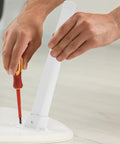 Four Pack Foldable Furniture Legs With Plastic And Iron Frame In White Portable Bed Or Table Leg Set being attached easily.