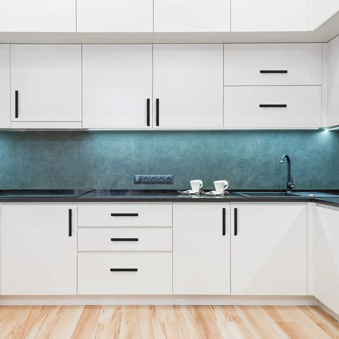 Modern kitchen with white cabinets and Thirty Pack Matte Black Cabinet Pulls Three Inch Cabinet Handles With Five Inch Overall Length.