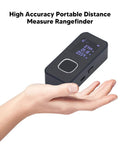 Handheld Laser Distance Meter With Aluminum Alloy Build, Dual Light Sensing Apertures, And Aspheric Focusing Mirror being held in a hand.