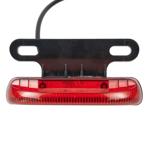 Slick E Bike Tail Light With Smart Brake Sensor For 36V To 48V Systems Ensures Your Night Rides Are Super Safe And Totally Lit For All The Commuters In Town. red ABS e bike tail light with wire and bracket
