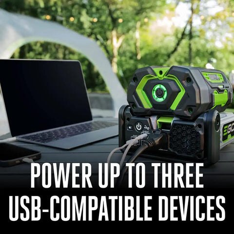 Hella Reliable Portable Pure Sine Wave Power Inverter Pumping 400w Continuous And 800w Peak Watts charging three USB devices outdoors.