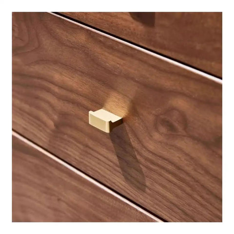Close-up of a drawer handle on the Kickass Executive Desk With Three Smooth Drawers And Raised Monitor Stand Perfect For Your Prime Home Office Or Gaming Rig In Rich Black Walnut Wood Finish 143 Cm Wide.