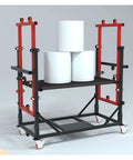 Heavy Duty Electric Lift Cart With Rock Solid Brakes And Smooth Rolling Wheels For Hassle Free Ceiling Painting and indoor or outdoor construction with cylindrical white objects.
