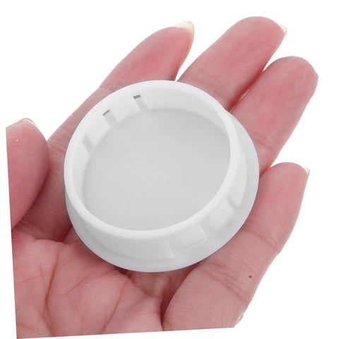 Round Plastic Hole Plugs 10 Pack For Furniture Quick Fix Cabinets Doors Walls Decorative Screw Covers Hide Holes Easy Install Durable Circle Hole Caps No Tools Needed shown in hand