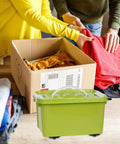 6 Pack Stick-On Adhesive Mini Swivel Caster Wheels For Furniture And Appliances on a green storage box in use