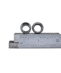 Close-up of 15 Pack Super Safety Conical Handle Wedges for Wood Splitting and Pruning next to a ruler for size comparison.