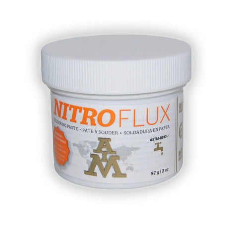NitroFlux soldering paste jar, 57g 2oz size, labeled in English, French, Spanish with ASTM B813 standard icon on white background.