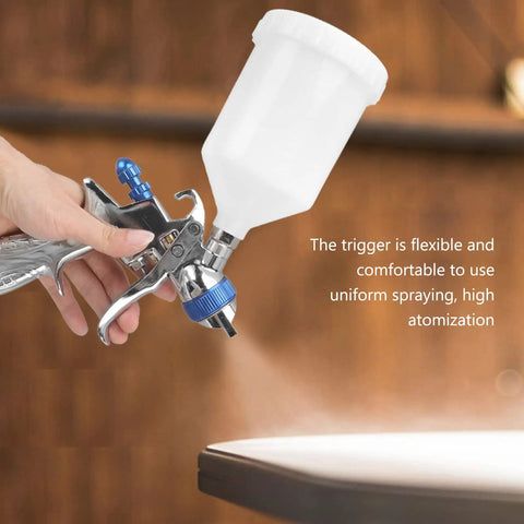 Top Shelf Aluminum Alloy Pneumatic Paint Sprayer With 1.4mm Nozzle, ergonomic grip, and 600ml cup, ideal for smooth coatings.