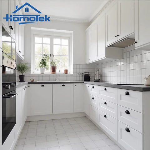 White kitchen with Matte Black Cup Drawer Pulls Five Pack for Cabinets and Furniture Dressers installed on white cabinets.
